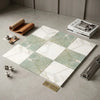 A set of checkerboard ming green and calacatta gold marble 12x12 tiles with green and white veined pattern