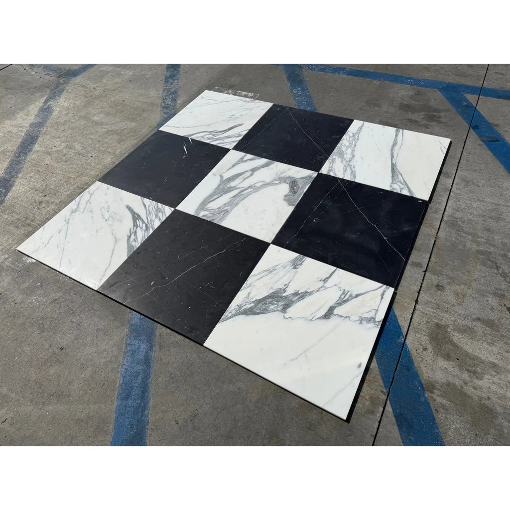 Black and white checkered Nero Marquina and Arabescato Corchia marble tiles set