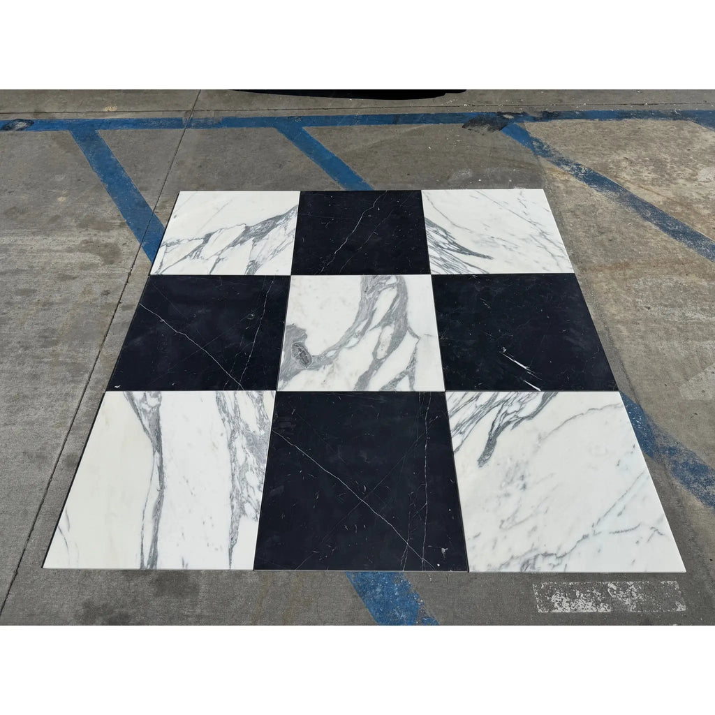 Black and white Nero Marquina and Arabescato Corchia marble checkerboard pattern setting