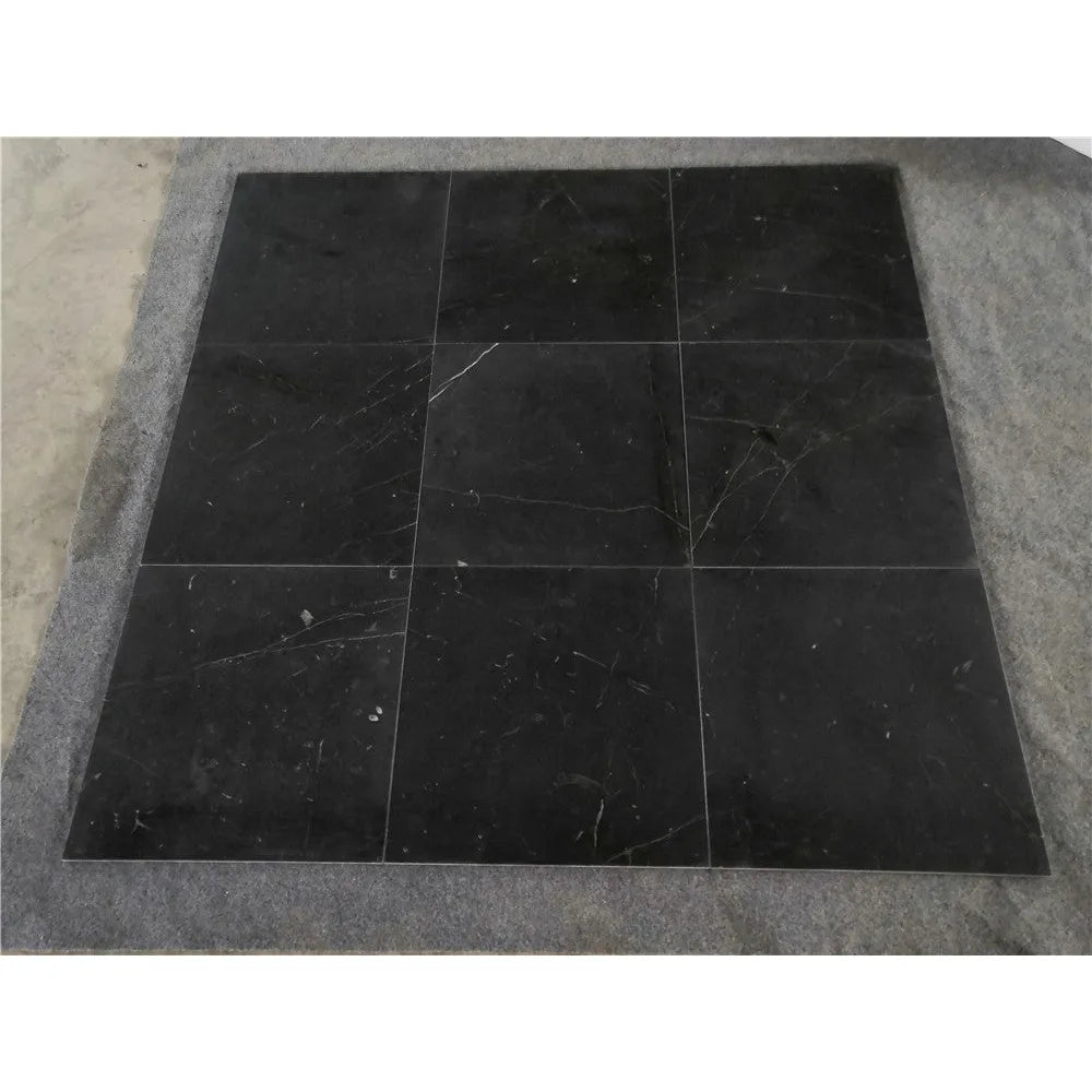 Nine black marble tiles from the Checkerboard Oriental White and Nero Marquina set