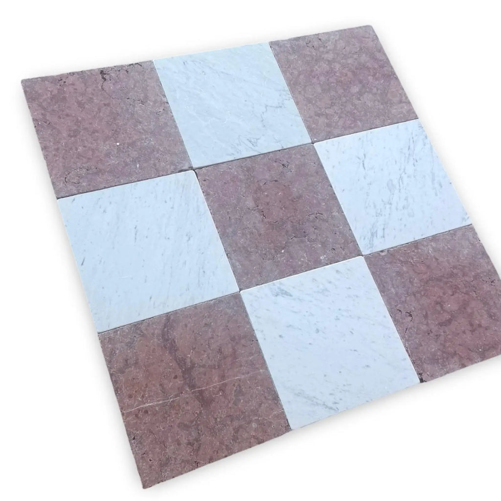 Checkerboard pattern of square tiles from Checkerboard Rojo Alicante and Carrara White 12X12 Tumbled Set