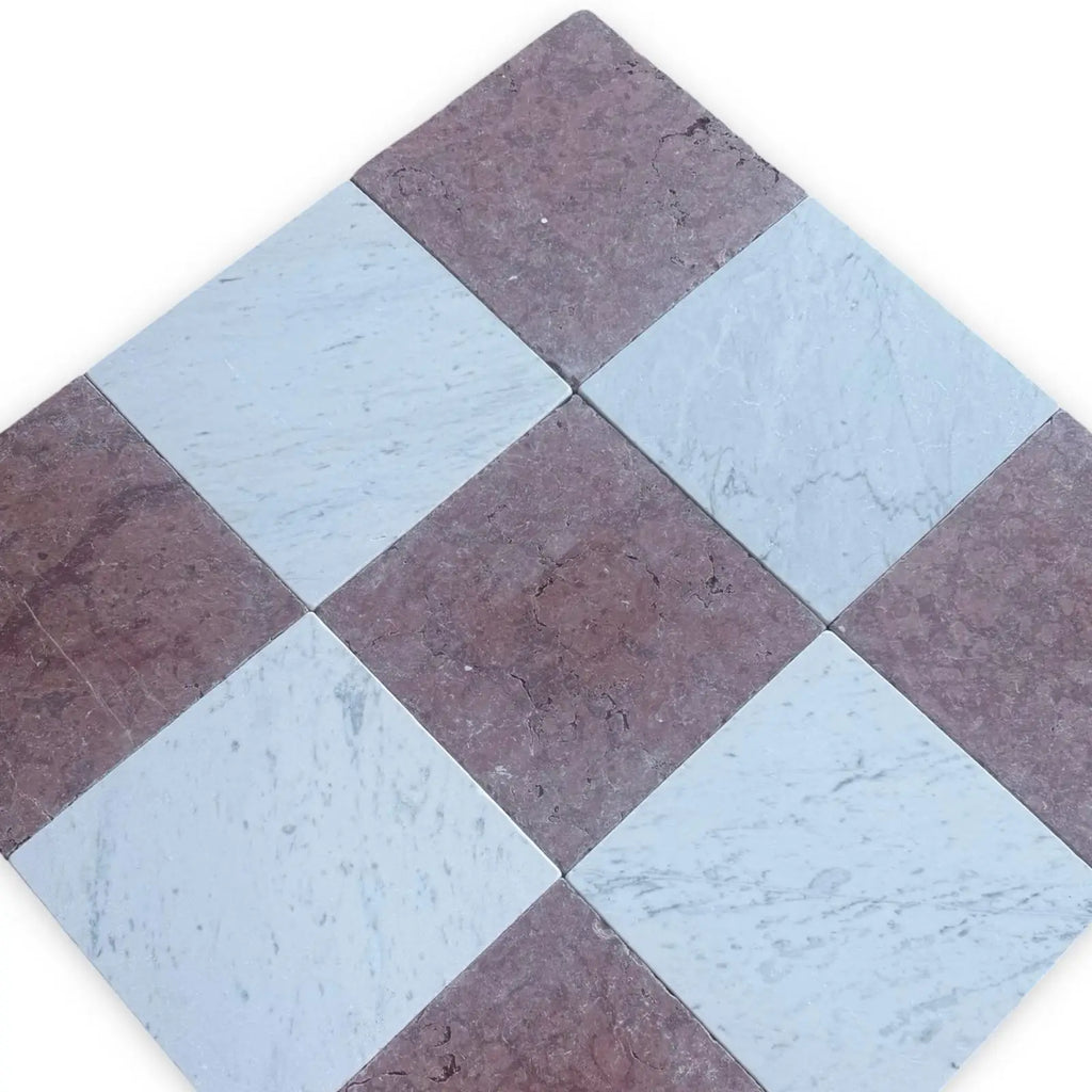 Checkerboard pattern of Red Alicante and Carrara White 12x12 tumbled square tiles