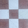 Checkerboard marble tiles from the Checkerboard Rojo Alicante and Carrara White 12x12 Tumbled Set