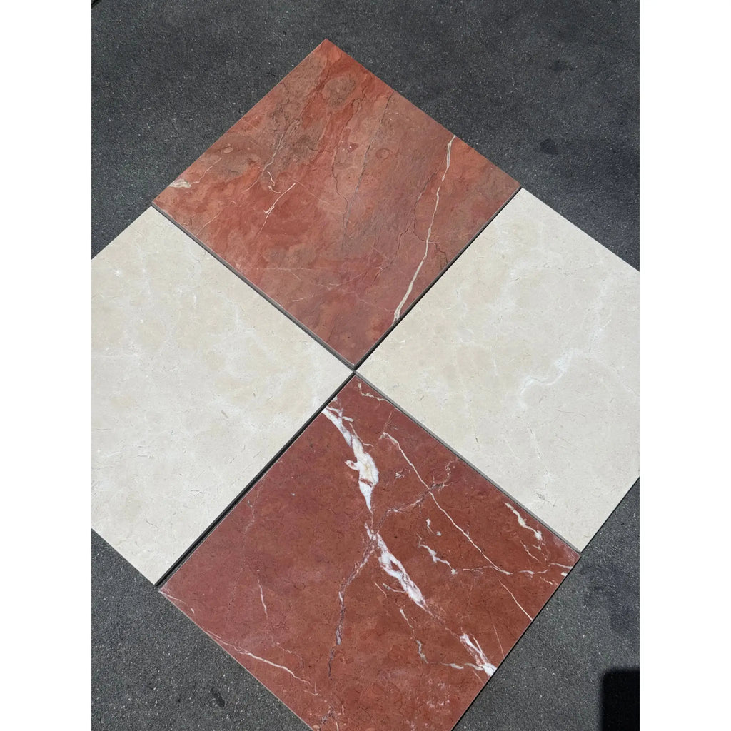 Four square marble tiles in Red Alicante and Crema Marfil Checkerboard pattern