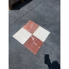 Four square marble tiles from the Checkerboard Rojo Alicante and Crema Marfil Marble 12X12 Set