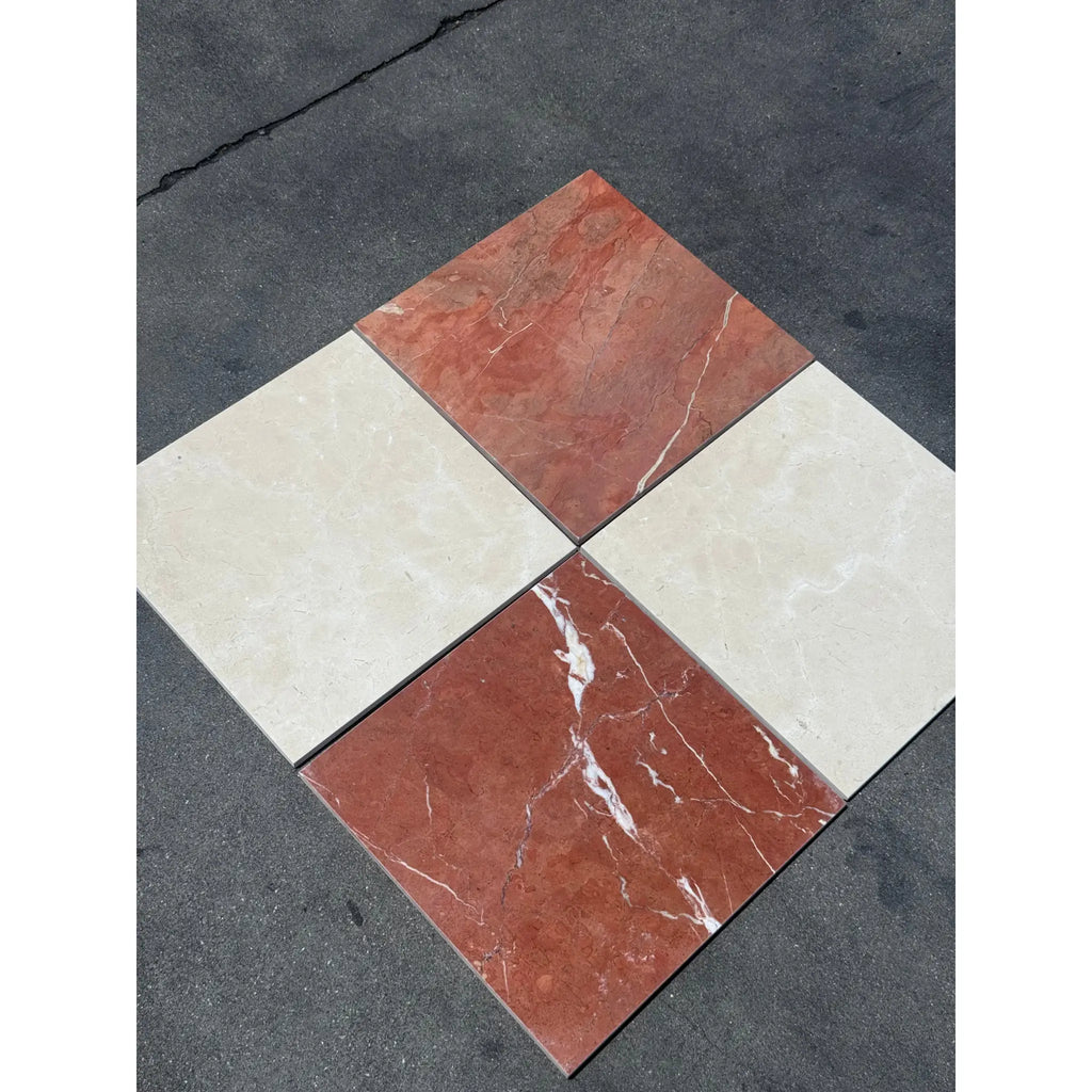 Four square marble tiles from Checkerboard Rojo Alicante and Crema Marfil set