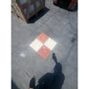 Four square tiles in a diamond pattern from Checkerboard Rojo Alicante and Crema Marfil Marble 12X12 Set