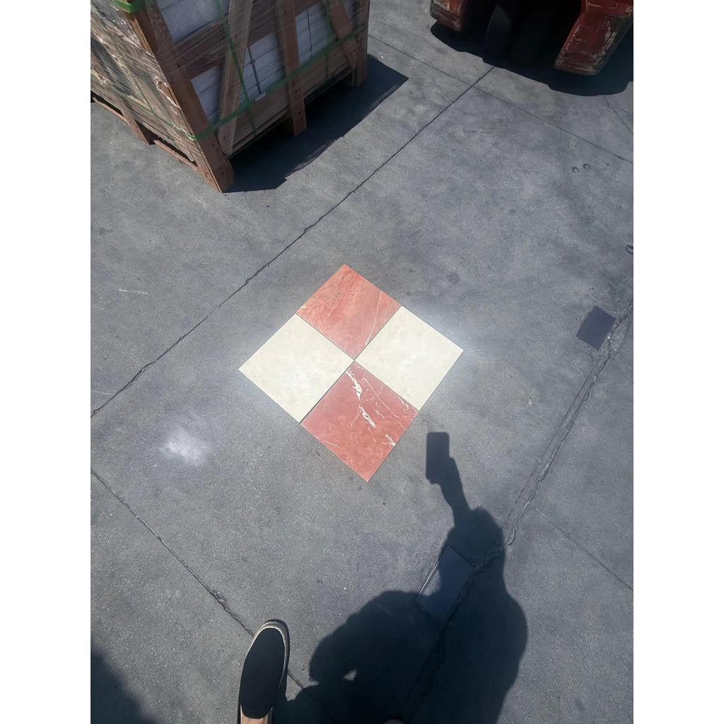 Four square tiles in a diamond pattern from Checkerboard Rojo Alicante and Crema Marfil Marble 12X12 Set