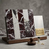 A sleek wooden display stand with vertical checkerboard rosso levanto calacatta viola imperiale marble tile samples and a surfaces galore metal panel
