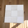 Polished Checkerboard White Onyx and Bianco Dolomite tiles in a nine-square grid with subtle veining