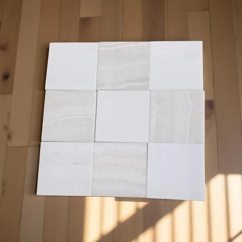 Polished Checkerboard White Onyx and Bianco Dolomite tiles in a nine-square grid with subtle veining