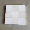 Checkerboard White Onyx and Bianco Dolomite polished tiles with white and beige squares