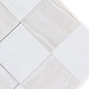 Checkerboard pattern of white Onyx and beige Bianco Dolomite tiles in polished finish