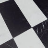 Black and white checkered floor tiles from Como in Oriental White and Nero Marquina set