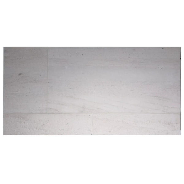Crema Haven 18x36 limestone tiles in light gray marble effect with subtle veining and polished finish