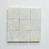 Crema Marfil 4X4 Tumbled natural stone tiles with light color and subtle veining