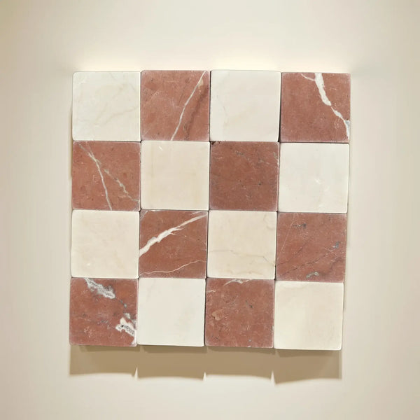 Checkerboard pattern of Crema Marfil 3X3 Tumbled marble tiles for elegant flooring