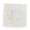 Crema Marfil 4x4 Tumbled marble tiles with light color and natural veining pattern