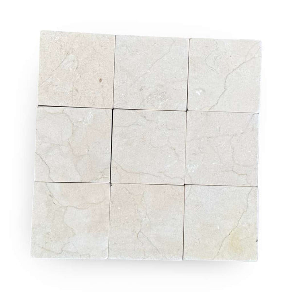 Crema Marfil 4x4 Tumbled marble tiles with light color and natural veining pattern