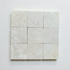 Crema Marfil 4X4 Tumbled natural stone tiles with light color and subtle veining