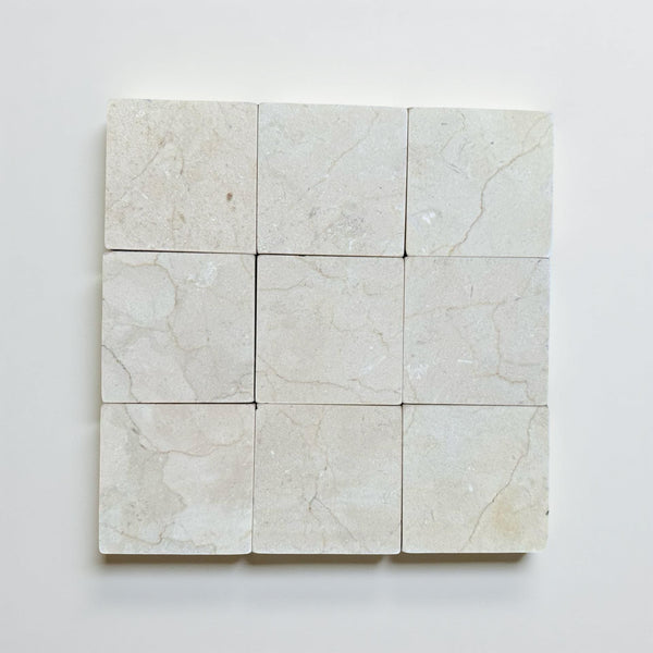 Crema Marfil 4X4 Tumbled natural stone tiles with light color and subtle veining