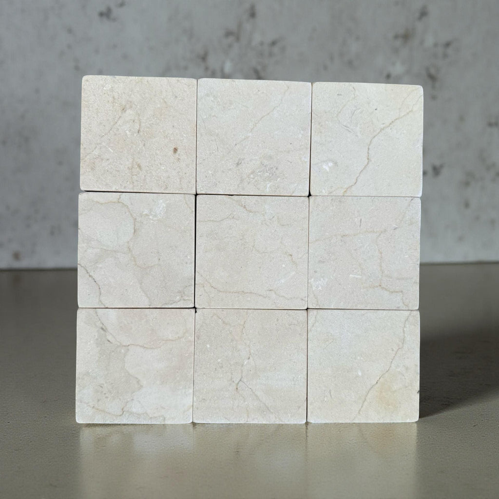 Crema Marfil 4X4 Tumbled marble tiles arranged in a 3x3 grid for elegant flooring