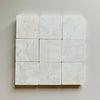 Crema Marfil 4X4 Tumbled off-white marble tiles with subtle veining pattern