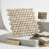 Beige Crema Marfil marble 1 inch hexagon mosaic tile with a tumbled finish and Spanish origin pattern