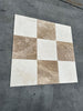 Beige and white Crema Marfil marble tile coaster set with checkered pattern
