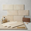Crema marfil marble 12x24 polished beige spanish marble tiles with subtle veining arranged in a staggered pattern