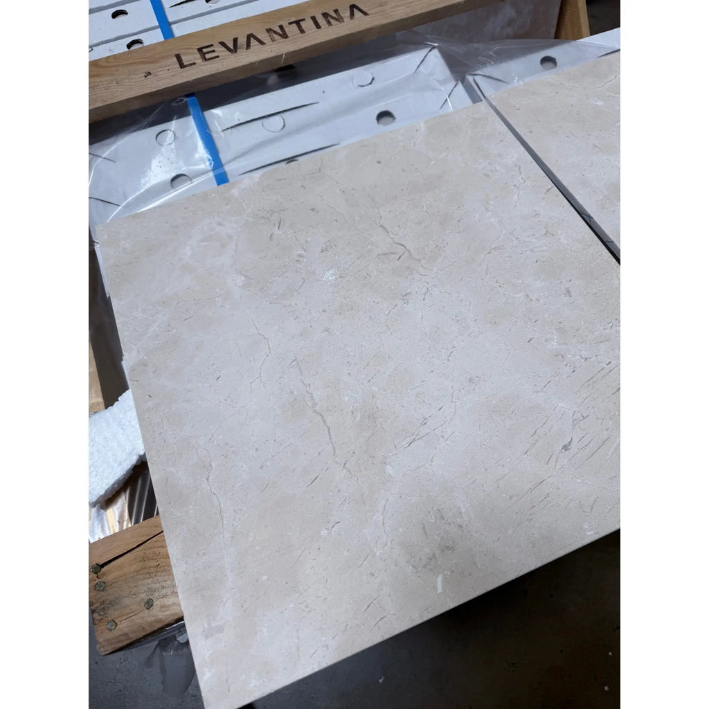 Crema Marfil beige marble 18x18 polished tile with subtle veining