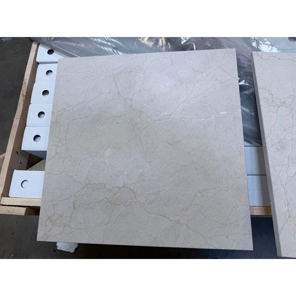 Crema Marfil beige marble 18x18 polished tile with subtle veining