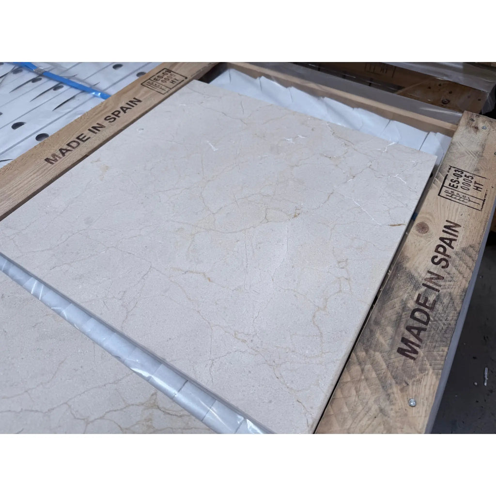 Crema Marfil marble 18x18 polished tile with cream veining