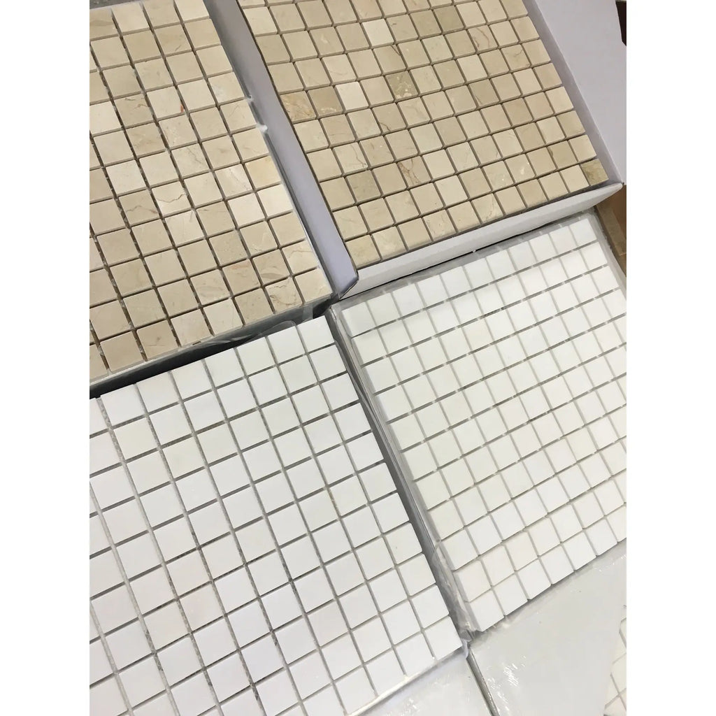 Crema Marfil Marble 1x1 polished beige and white mosaic tiles in grid pattern