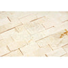 Beige stacked stone wall from Crema Marfil Marble 1X2 Brick Mosaic Split-Faced