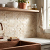 Crema Marfil marble 1x2 brick mosaic beige stone tile backsplash with rustic textured split-faced finish