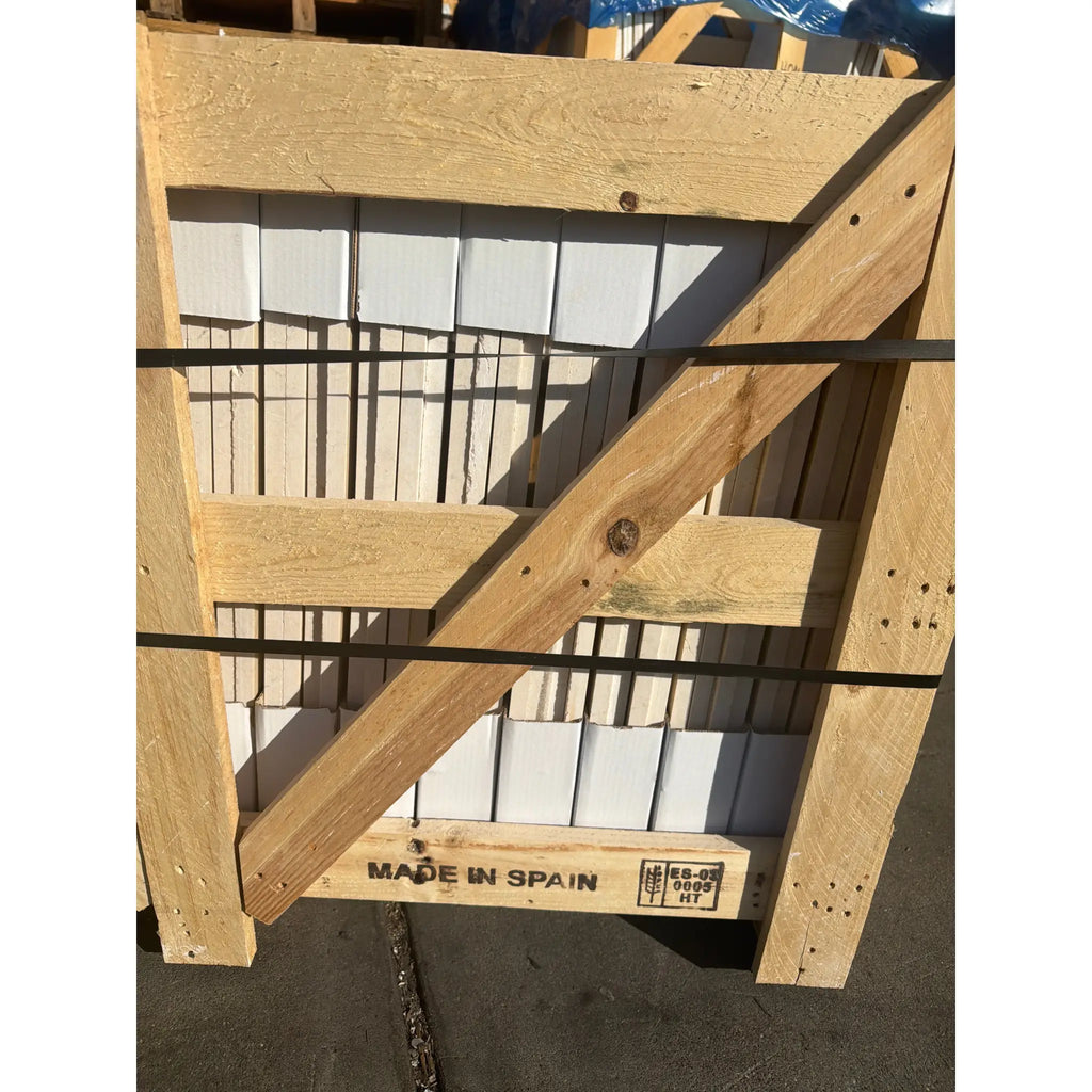 Light wooden crate with ES-02 0006 MT label for Crema Marfil Marble 24x24 Polished or Honed