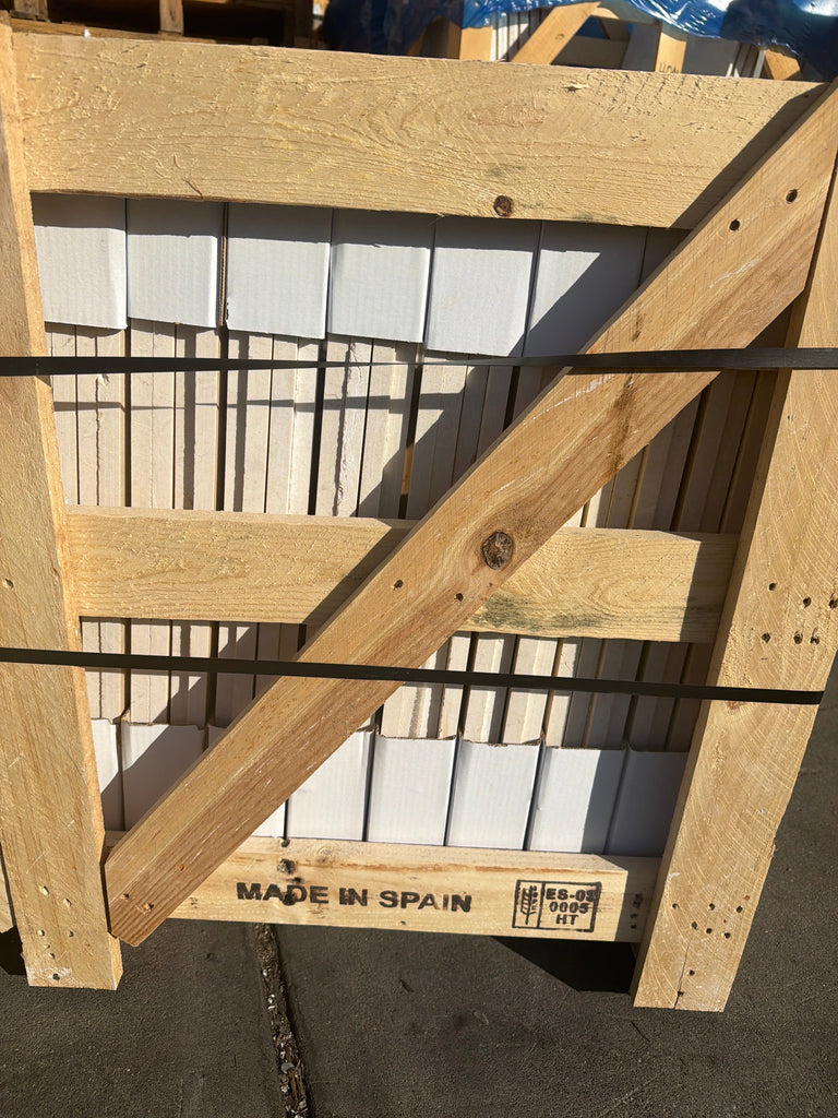 Light wooden crate with ES-02 0006 MT label for Crema Marfil Marble 24x24 Polished or Honed