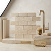 Beige crema marfil marble 2x4 brick mosaic panel with polished finish and subtle veining pattern