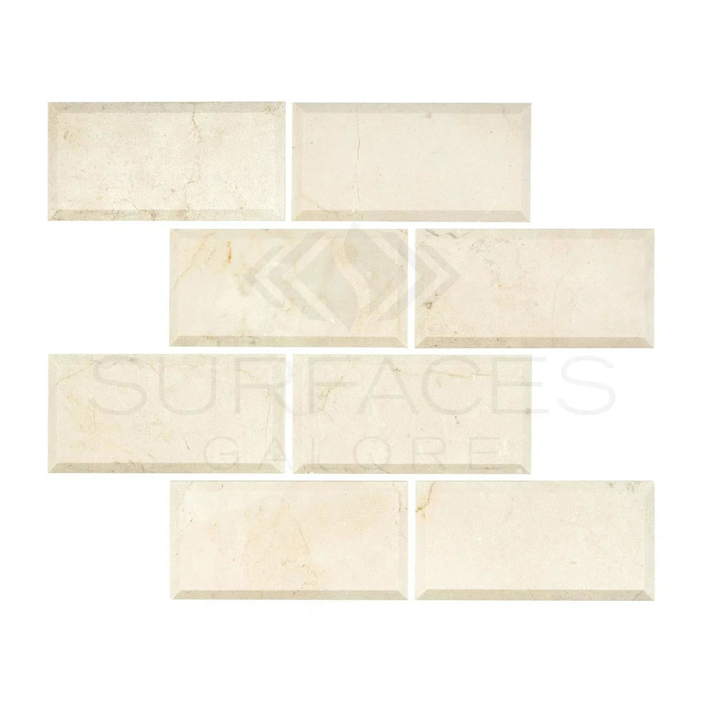 Rectangular, off-white beveled tiles from Crema Marfil Marble 2X4 Deep-Beveled Mosaic