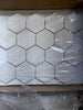 Crema Marfil Marble 3-inch tumbled hexagon mosaic in light gray matte finish