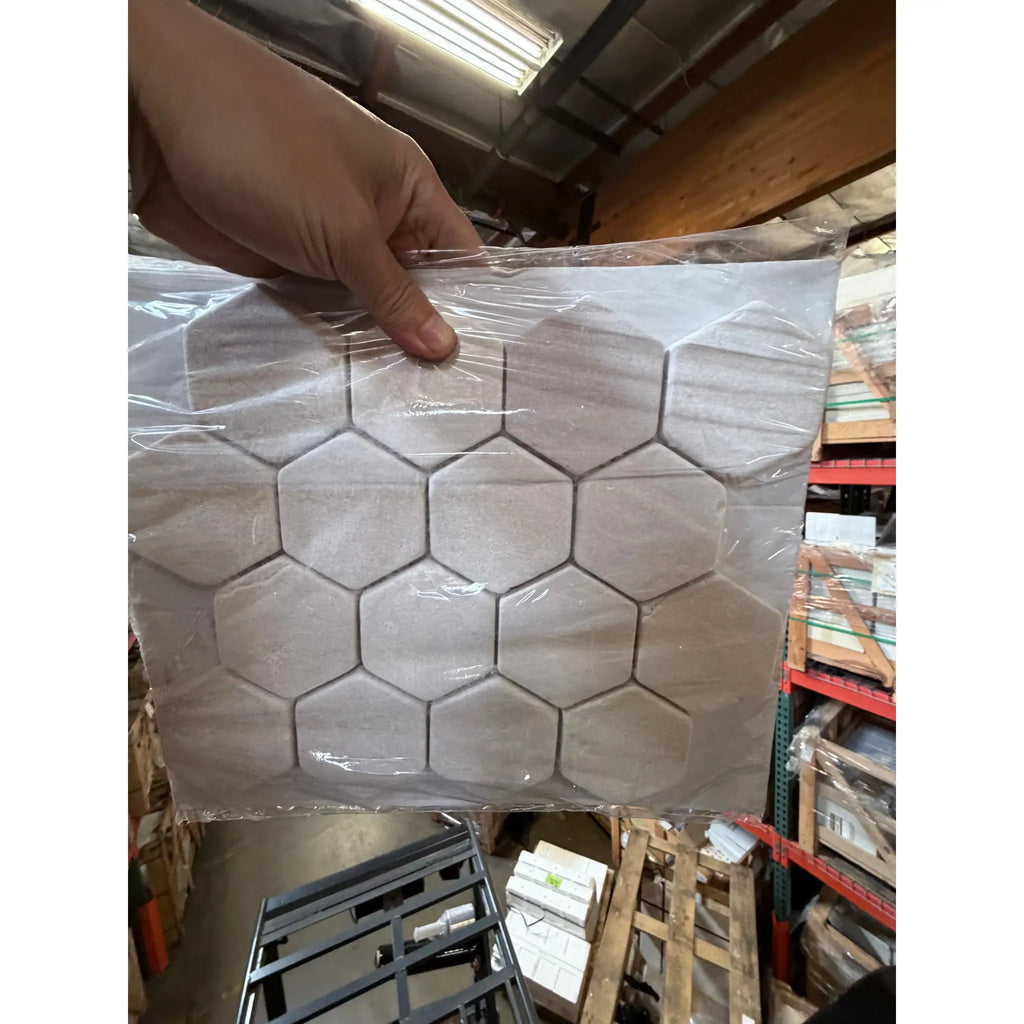 Crema Marfil Marble 3-inch Hexagon Mosaic Tumbled Tile Sheet in Clear Plastic