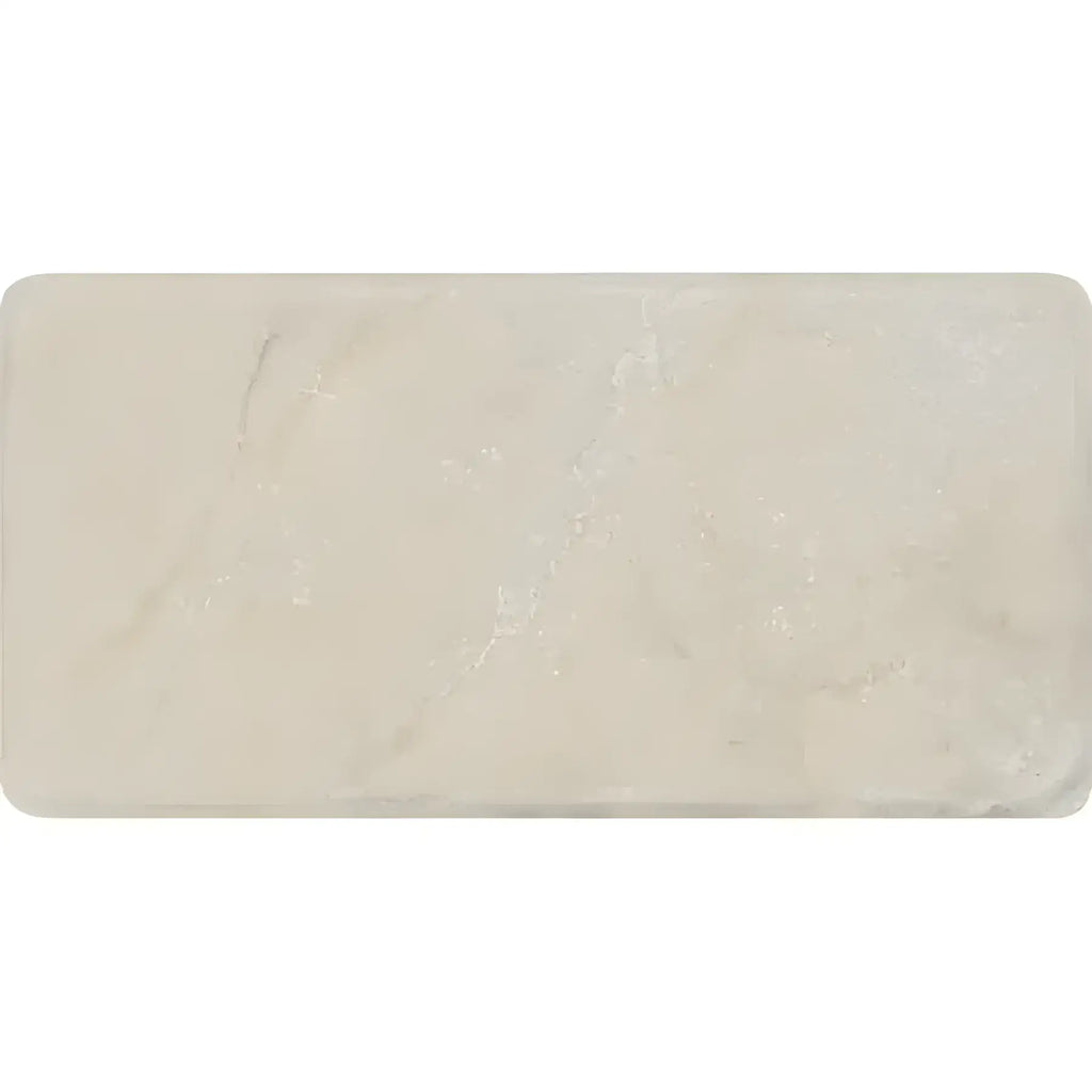 Rectangular bar of Crema Marfil Marble 3X6 Tumbled soap showcasing elegant design
