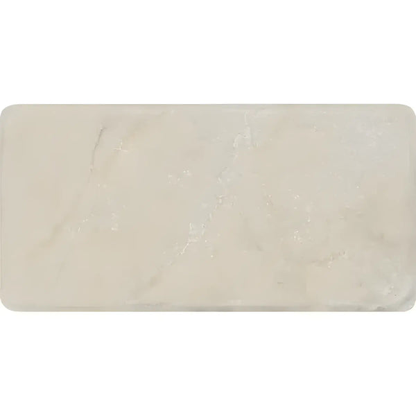 Rectangular bar of Crema Marfil Marble 3X6 Tumbled soap showcasing elegant design