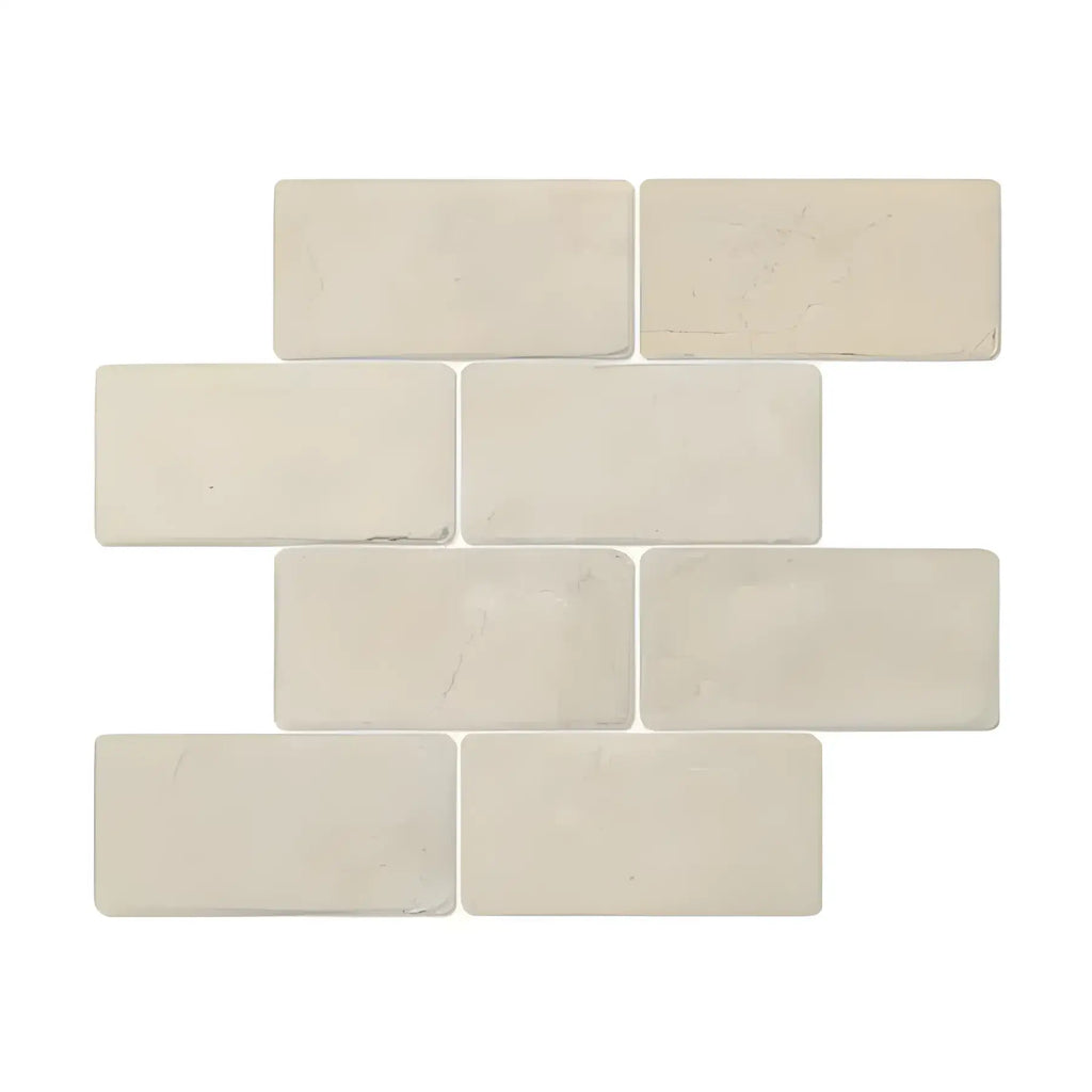 Off-white rectangular brick pattern in Crema Marfil Marble 3X6 Tumbled product