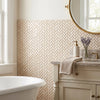 Beige crema marfil marble 5/8x1 1/4 herringbone mini mosaic polished backsplash tile with a subtle sheen