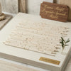 A cream-colored crema marfil marble bamboo sticks mosaic tile with subtle veining in an overlapping brick pattern
