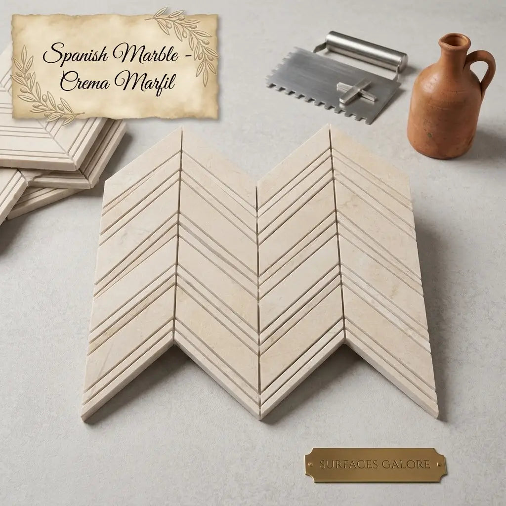 Beige spanish crema marfil marble chevron mosaic tiles with subtle veining and polished finish large size