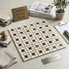 Crema marfil marble pinwheel mini mosaic tile in beige and dark brown with polished basketweave pattern and emp dark dots