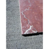 Crema Marrfil Rustic Modern Tumbled reddish-pink marble tile with white veining on gray concrete
